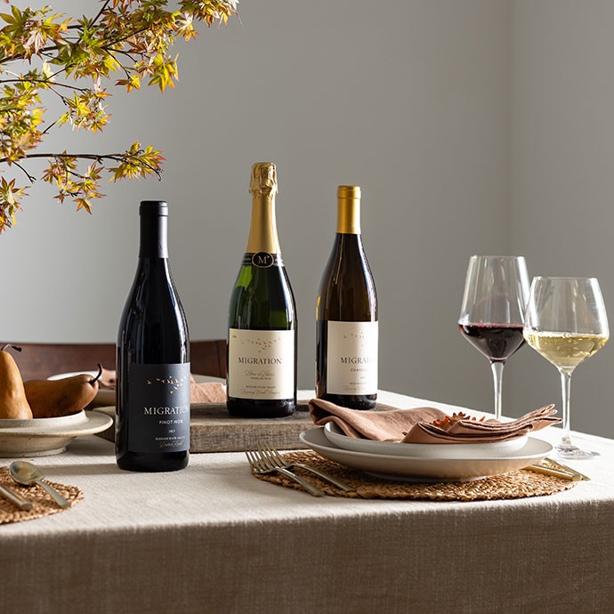 Two Migration wines on a table