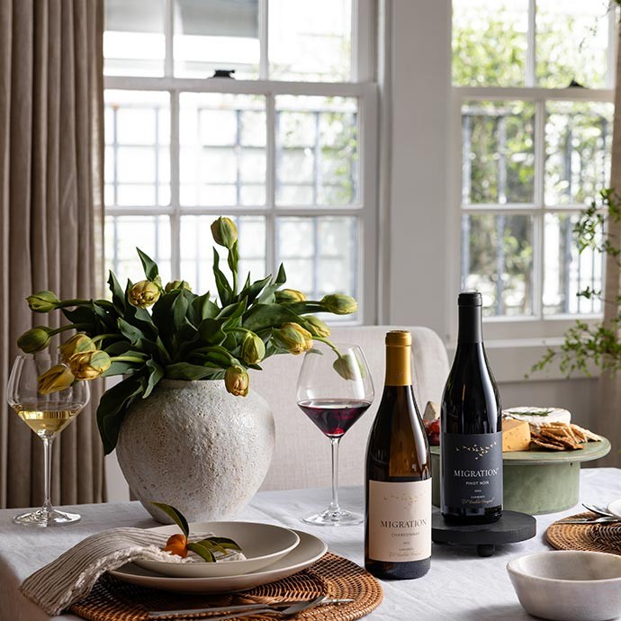 Two Migration wines on a table